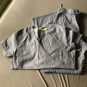 Gray scrubs top and bottom are both smalls